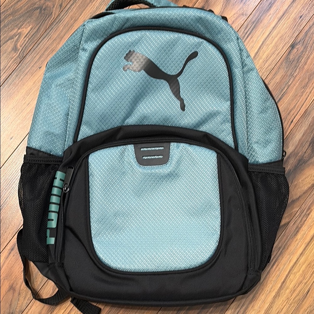 Puma light teal backpack new never used